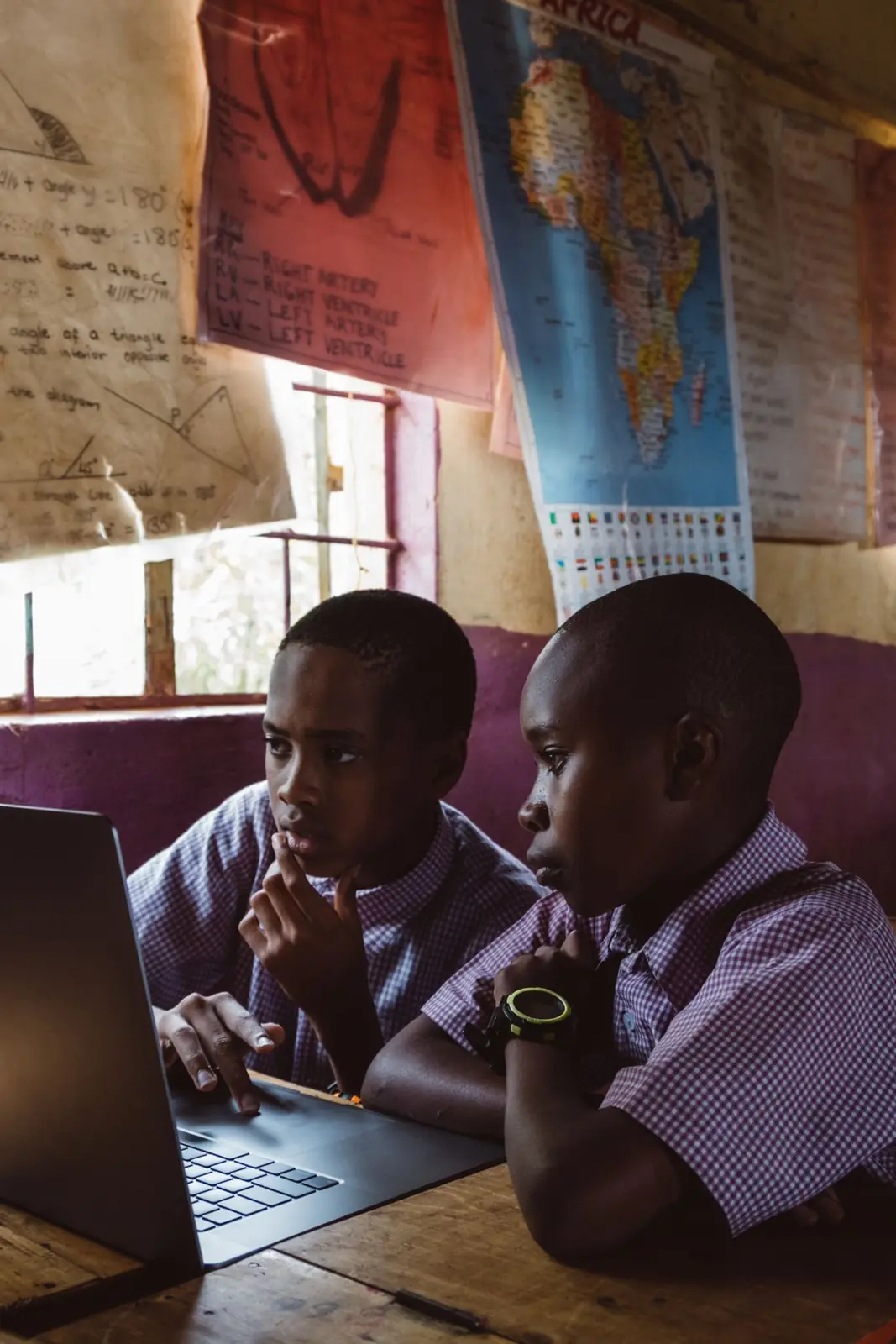 Pupils learning on a laptop