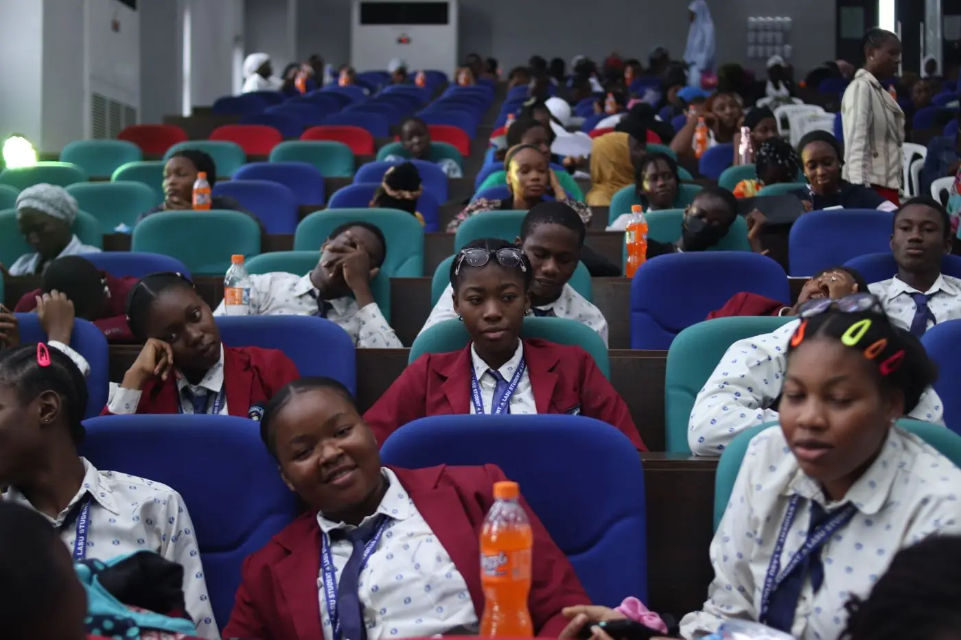 A full lecture hall of students